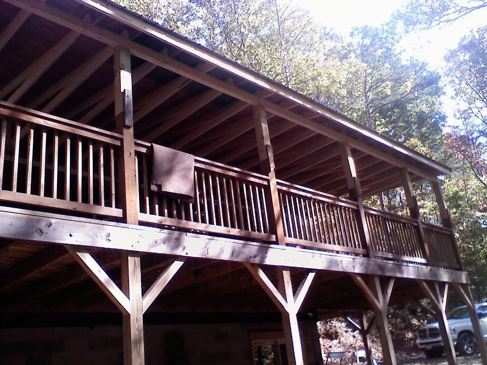 Timber framing under a new elevated porch and deck — Roof Leak Repair in Wilkesville by Roofing Brothers